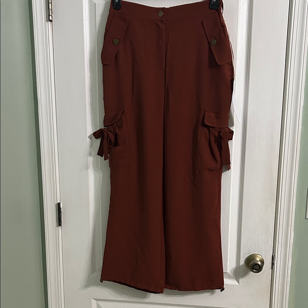Lumiere size Medium boho pants. Size pockets on legs and front of pants. NWT